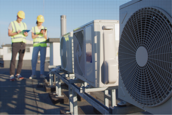 Commercial facility managers conducting a rooftop HVAC system audit to safeguard building occupants and indoor air quality.